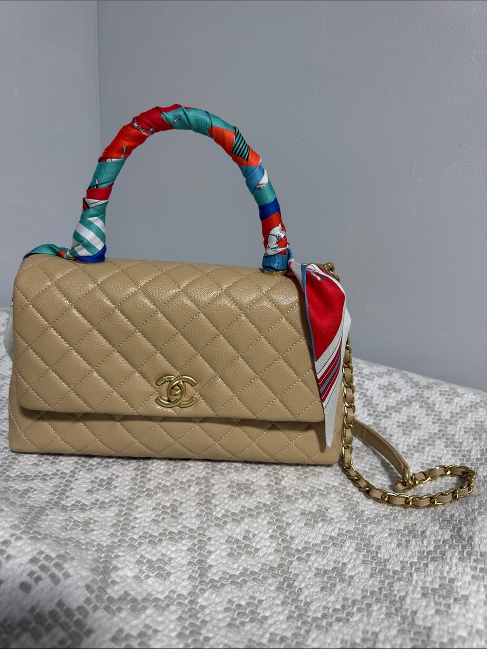 Beige Quilted Leather Top-Handle Bag with Gold Chain